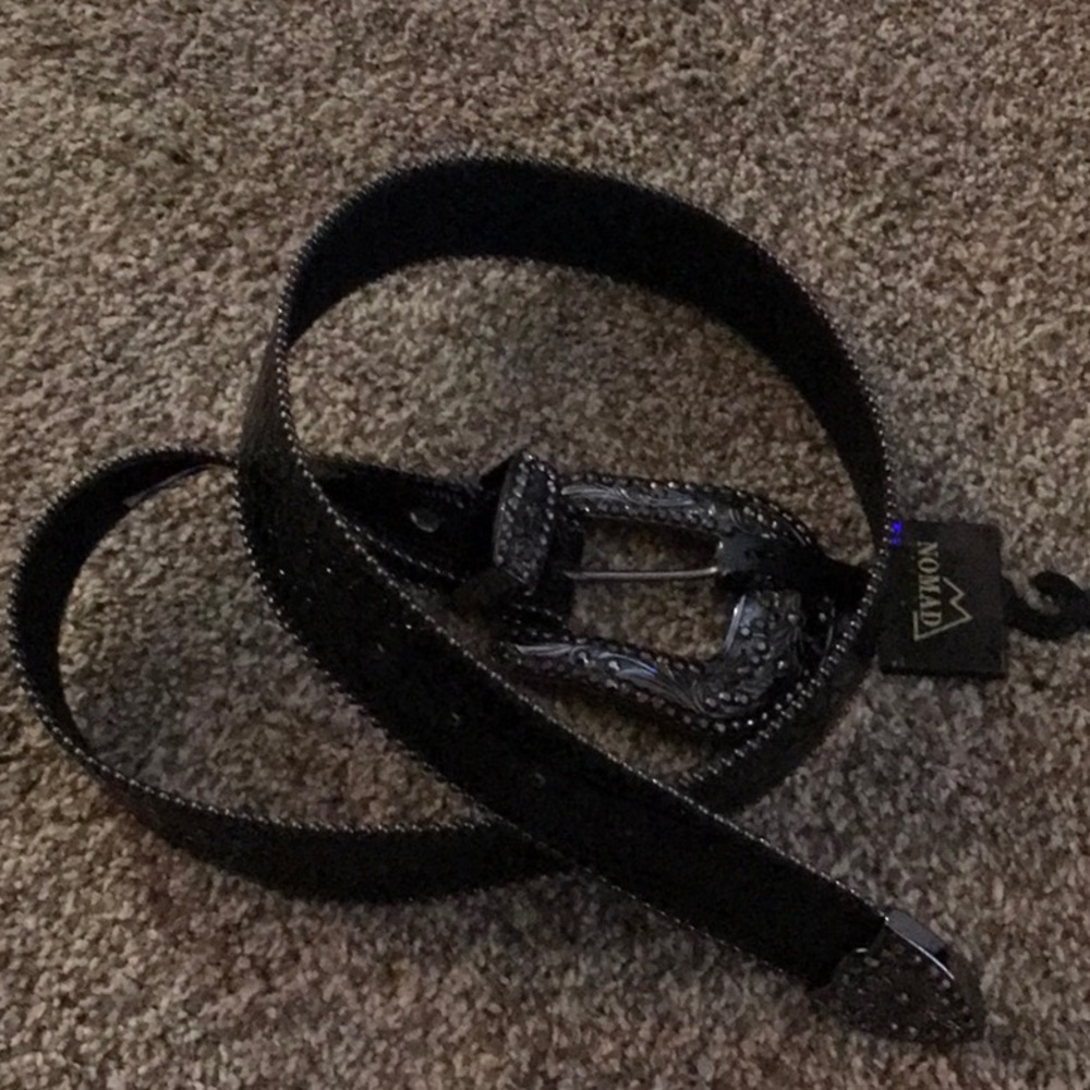 Women’s black size Med/large Nomad Creek blingy western belt.
